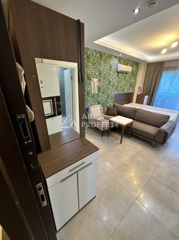 Квартира-студия в центре Махмутлара, рези денция отельного типа, море в 500 метрах - Ракурс 4