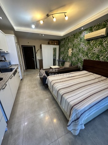 Квартира-студия в центре Махмутлара, рези денция отельного типа, море в 500 метрах - Ракурс 11