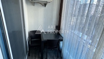 Квартира-студия в центре Махмутлара, рези денция отельного типа, море в 500 метрах - Ракурс 13