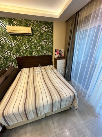 Квартира-студия в центре Махмутлара, рези денция отельного типа, море в 500 метрах - Ракурс 13