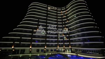 Квартира-студия в центре Махмутлара, рези денция отельного типа, море в 500 метрах - Ракурс 24