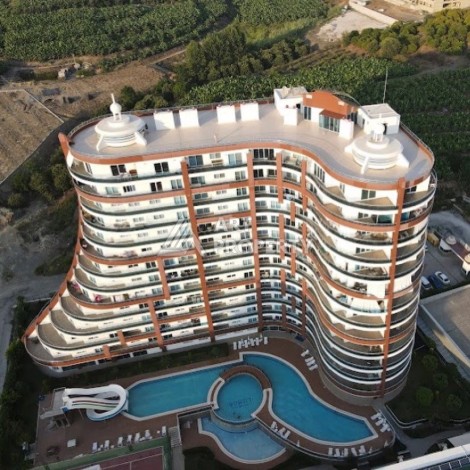 Квартира-студия в центре Махмутлара, рези денция отельного типа, море в 500 метрах - Ракурс 33