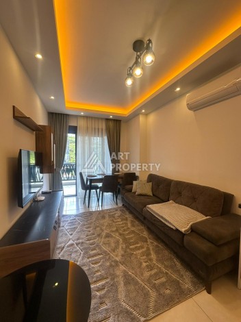 Квартира 1+1 в аренду в комплексе с богатой инфраструктурой, район Махмутлар. - Ракурс 1