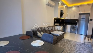 Квартира 1+1 в аренду в комплексе с богатой инфраструктурой, район Махмутлар. - Ракурс 4