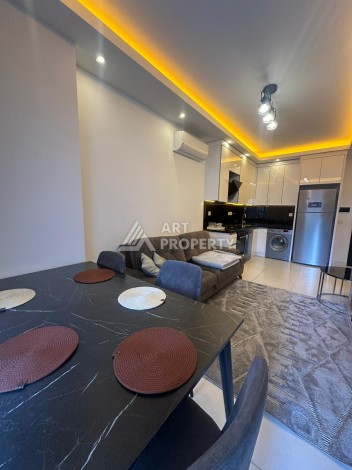 Квартира 1+1 в аренду в комплексе с богатой инфраструктурой, район Махмутлар. - Ракурс 3