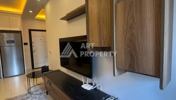 Квартира 1+1 в аренду в комплексе с богатой инфраструктурой, район Махмутлар. - Ракурс 5