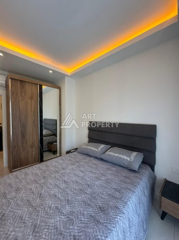 Квартира 1+1 в аренду в комплексе с богатой инфраструктурой, район Махмутлар. - Ракурс 7