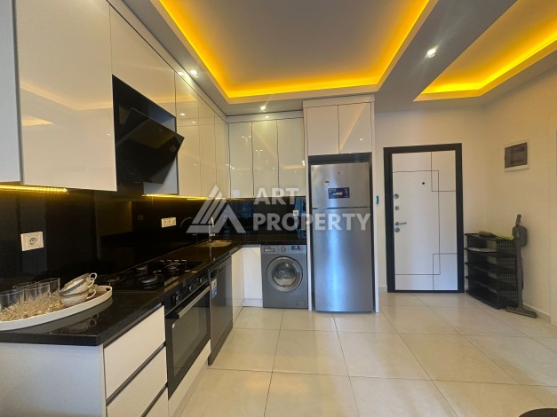 Квартира 1+1 в аренду в комплексе с богатой инфраструктурой, район Махмутлар. - Ракурс 10