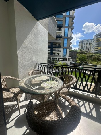 Квартира 1+1 в аренду в комплексе с богатой инфраструктурой, район Махмутлар. - Ракурс 12