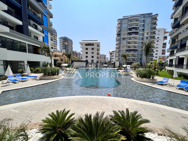 Квартира 1+1 в аренду в комплексе с богатой инфраструктурой, район Махмутлар. - Ракурс 39