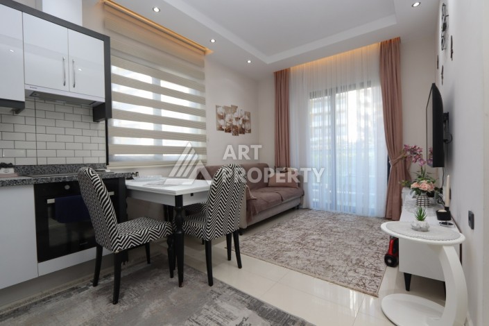 Уютная квартира 1+1 в современном комплексе в районе Авсаллар - Ракурс 4