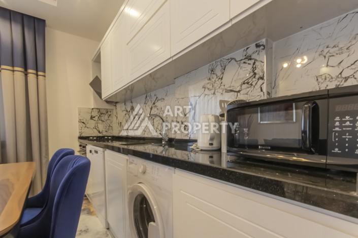 Уютная меблированная квартира 1+1 в районе Каргыджак, Аланья - Ракурс 11