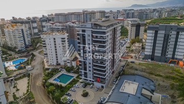 Уютная меблированная квартира 2+1 у моря в Махмутларе, Аланья - Ракурс 7