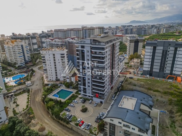 Квартира 2+1 с отдельной кухней, 102 м². Махмутлар,Алания - Ракурс 2