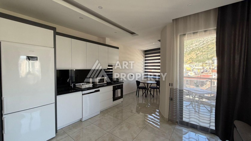 Просторная квартира 1+1 в районе пляжа Клеопатры в Алании — 65 м², 700 метров до моря - Ракурс 2