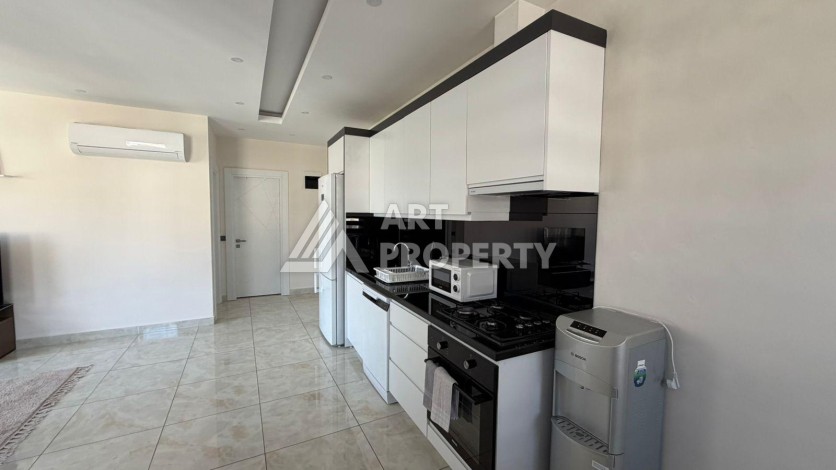 Просторная квартира 1+1 в районе пляжа Клеопатры в Алании — 65 м², 700 метров до моря - Ракурс 7