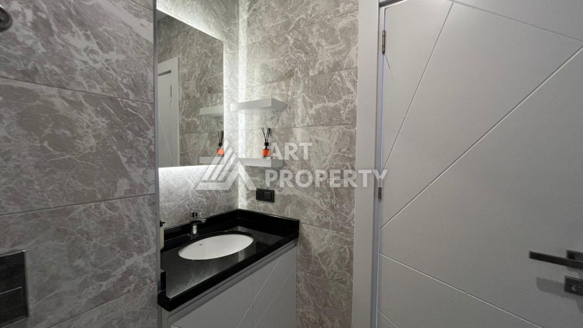 Просторная квартира 1+1 в районе пляжа Клеопатры в Алании — 65 м², 700 метров до моря - Ракурс 17