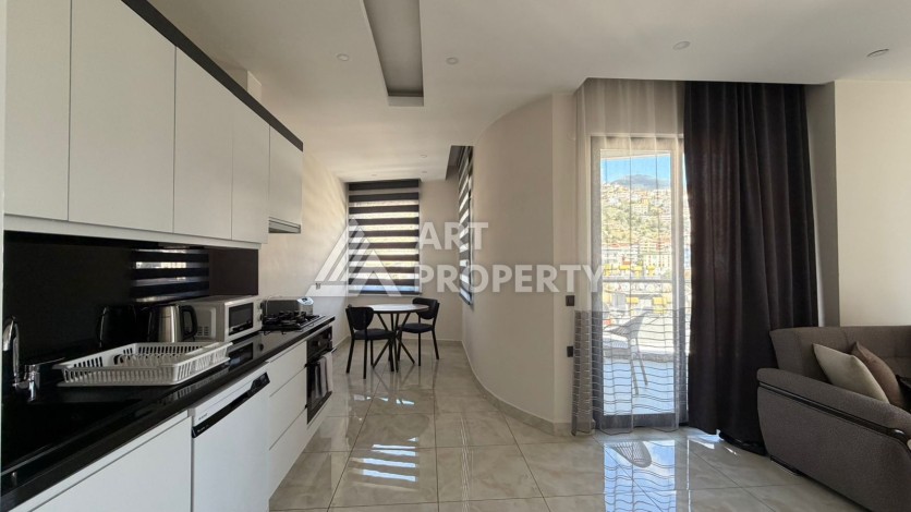 Просторная квартира 1+1 в районе пляжа Клеопатры в Алании — 65 м², 700 метров до моря - Ракурс 18