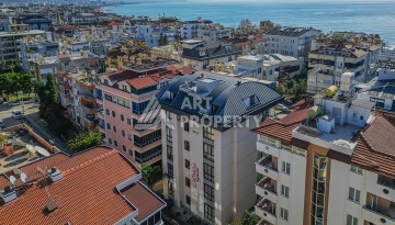 Дуплекс 2+1 в центре камерной резиденции в 200 м от моря в центре Алании - Ракурс 13