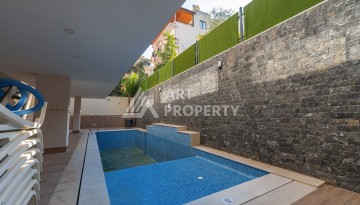 Дуплекс 2+1 в центре камерной резиденции в 200 м от моря в центре Алании - Ракурс 28