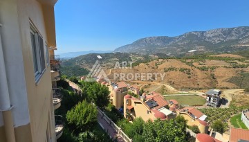 Просторный меблированный дуплекс 2+1 с панорамными видами на горы и город в  районе Каргыджак. - Ракурс 16