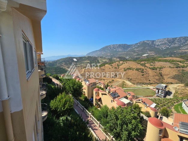 Просторный меблированный дуплекс 2+1 с панорамными видами на горы и город в  районе Каргыджак. - Ракурс 15