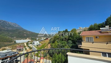 Просторный меблированный дуплекс 2+1 с панорамными видами на горы и город в  районе Каргыджак. - Ракурс 18