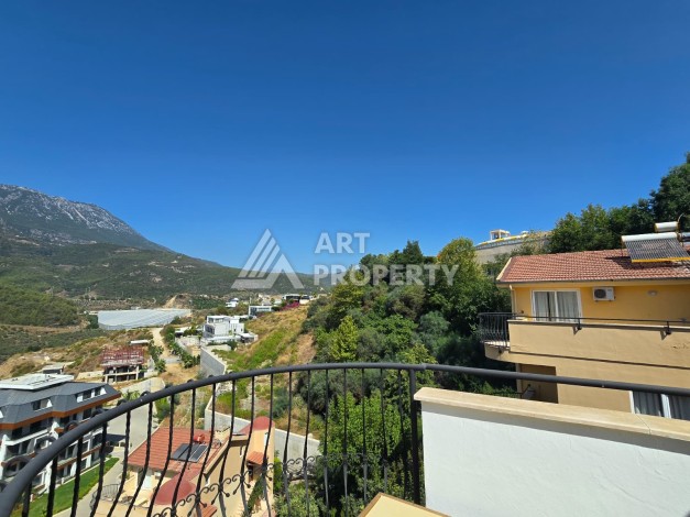 Просторный меблированный дуплекс 2+1 с панорамными видами на горы и город в  районе Каргыджак. - Ракурс 17