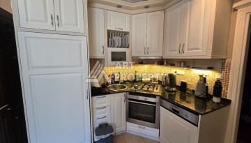 Просторный меблированный дуплекс 2+1 с панорамными видами на горы и город в  районе Каргыджак. - Ракурс 27