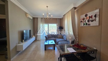 Просторный меблированный дуплекс 2+1 с панорамными видами на горы и город в  районе Каргыджак. - Ракурс 28