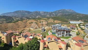 Просторный меблированный дуплекс 2+1 с панорамными видами на горы и город в  районе Каргыджак. - Ракурс 29