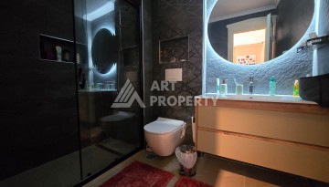 Просторный меблированный дуплекс 2+1 с панорамными видами на горы и город в  районе Каргыджак. - Ракурс 31