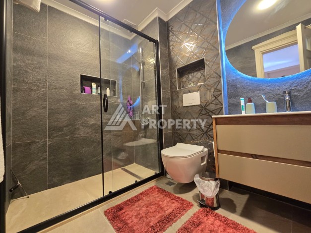 Просторный меблированный дуплекс 2+1 с панорамными видами на горы и город в  районе Каргыджак. - Ракурс 32