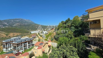 Просторный меблированный дуплекс 2+1 с панорамными видами на горы и город в  районе Каргыджак. - Ракурс 34