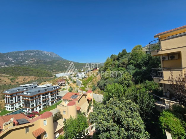 Просторный меблированный дуплекс 2+1 с панорамными видами на горы и город в  районе Каргыджак. - Ракурс 33