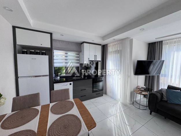 Меблированная квартира 1+1 у пляжа Клеопатры, 47 кв.м - Ракурс 0