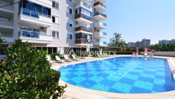 Квартира 1+1 с видом на море в Махмутларе, 70 кв.м. - Ракурс 3