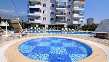 Квартира 1+1 с видом на море в Махмутларе, 70 кв.м. - Ракурс 7