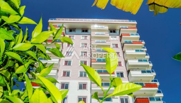 Квартира 1+1 с видом на море в Махмутларе, 70 кв.м. - Ракурс 9