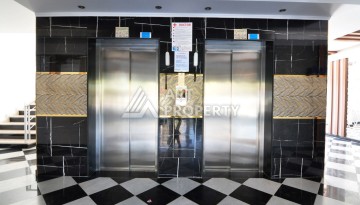 Квартира 1+1 с видом на море в Махмутларе, 70 кв.м. - Ракурс 15