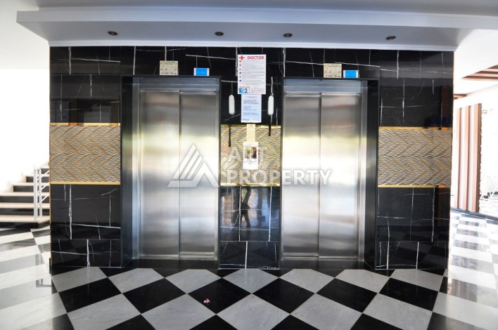 Квартира 1+1 с видом на море в Махмутларе, 70 кв.м. - Ракурс 14