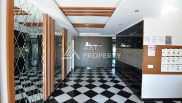 Квартира 1+1 с видом на море в Махмутларе, 70 кв.м. - Ракурс 16