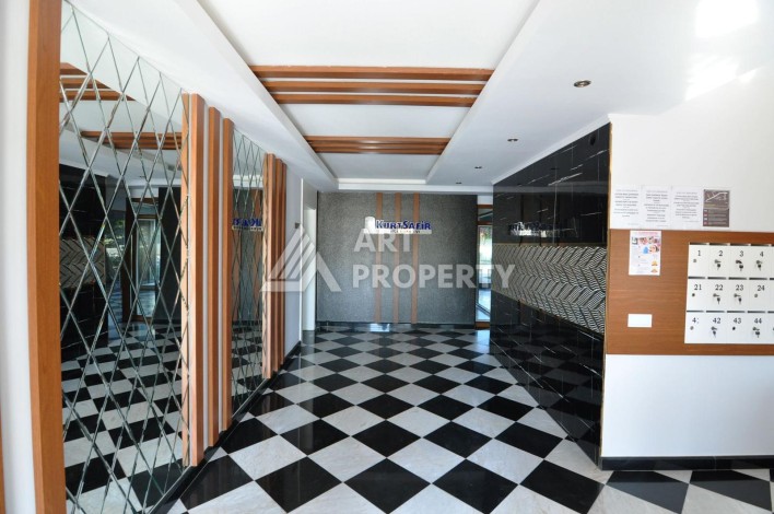 Квартира 1+1 с видом на море в Махмутларе, 70 кв.м. - Ракурс 15