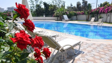 Квартира 1+1 с видом на море в Махмутларе, 70 кв.м. - Ракурс 18