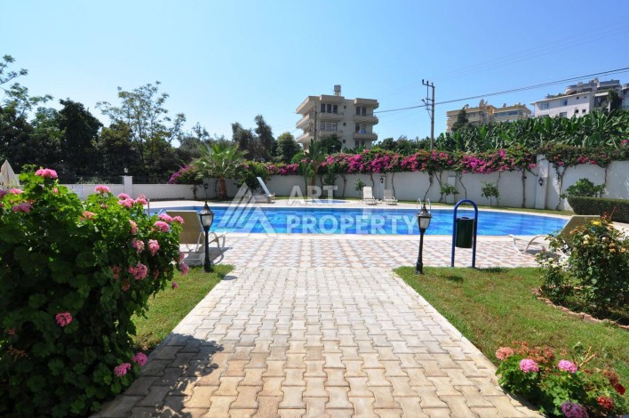 Квартира 1+1 с видом на море в Махмутларе, 70 кв.м. - Ракурс 19