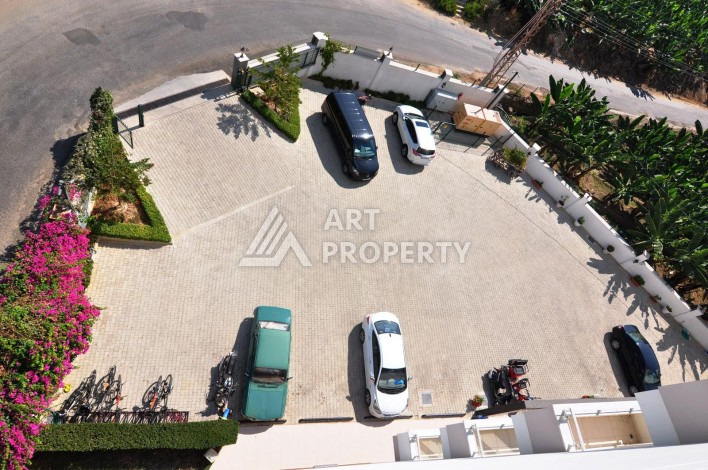 Квартира 1+1 с видом на море в Махмутларе, 70 кв.м. - Ракурс 20