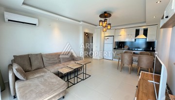 Квартира 1+1 с видом на море в Махмутларе, 70 кв.м. - Ракурс 25