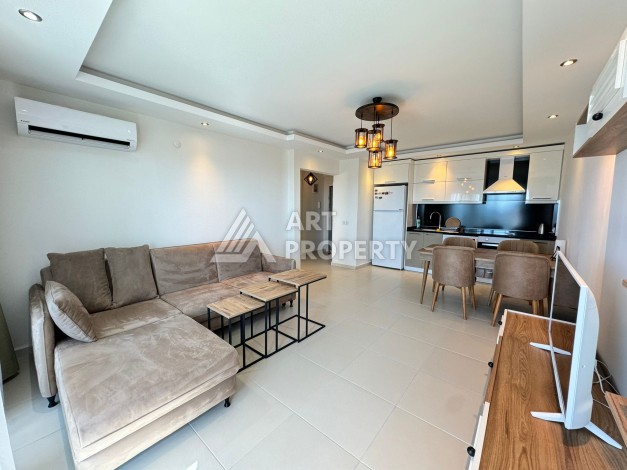 Квартира 1+1 с видом на море в Махмутларе, 70 кв.м. - Ракурс 24