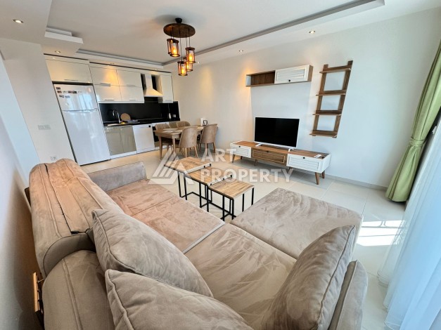 Квартира 1+1 с видом на море в Махмутларе, 70 кв.м. - Ракурс 25