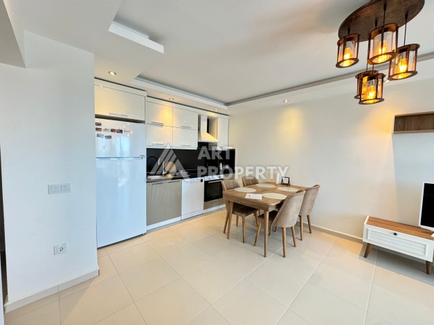 Квартира 1+1 с видом на море в Махмутларе, 70 кв.м. - Ракурс 26